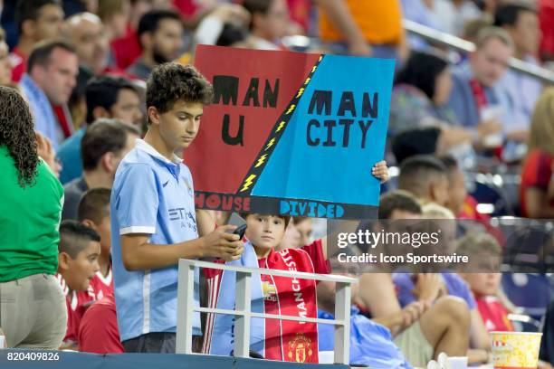 Manchester City and Manchester City fans showing hid support prior to the Premier Soccer League game between Manchester United and the Manchester...