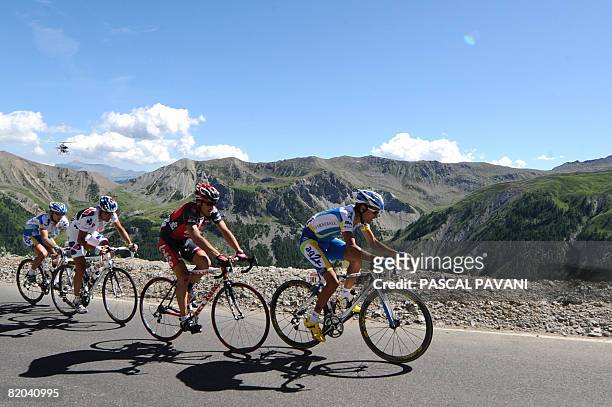 Four leading riders, from R, French team leader Cyril Dessel , Spanish David Arroyo , French Sandy Casar and Slovenian Tadej Valjavec ride in the Col...