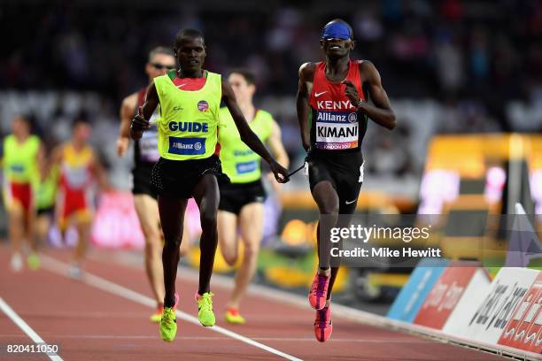 Samwel Mushai Kimani of Kenya crosses the line to win the Mens 1500m T11 final during day eight of the IPC World ParaAthletics Championships 2017 at...