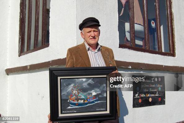 Patsy Rodgers Patsy Dan Rodgers, the 'King' of Tory Island, poses with one of his ...