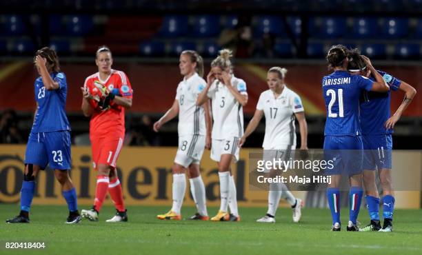 Marta Carissimi and Barbara Bonansea of Italy look dejected after the Group B match between Germany and Italy during the UEFA Women's Euro 2017 at...
