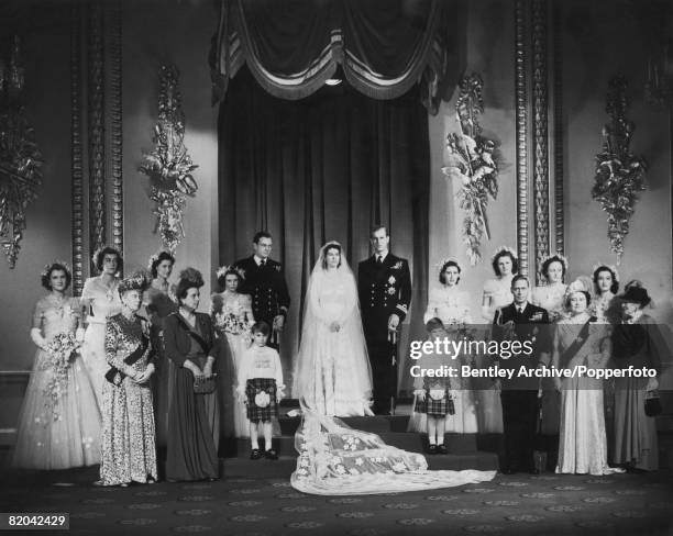 Princess Elizabeth and Philip, Duke of Edinburgh, pose with King George VI and Queen Elizabeth and other members of the royal family at Buckingham...