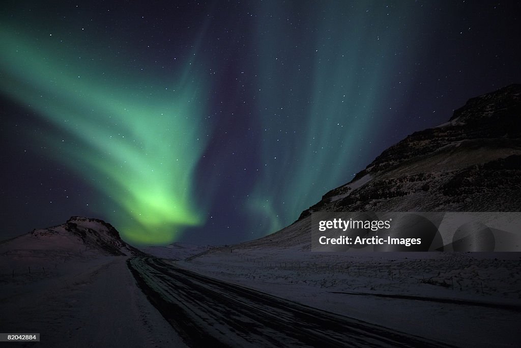 Aurora Borealis with Winter Road, Iceland