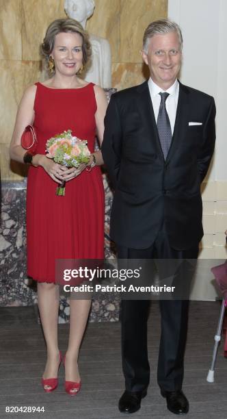 King Philippe of Belgium and Queen Mathilde of Belgium arrive for a prelude concert by the Belgian National Orchestra on the eve of the Belgian...