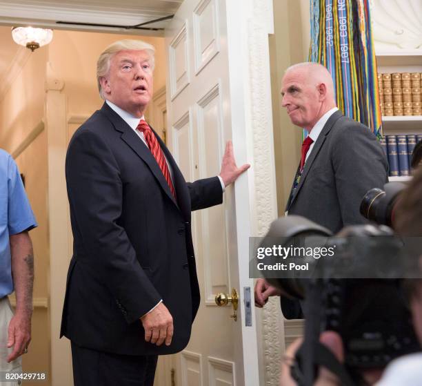 President Donald J. Trump departs after meeting with visiting USS Arizona survivors at the White House on July 21, 2017 in Washington, DC.