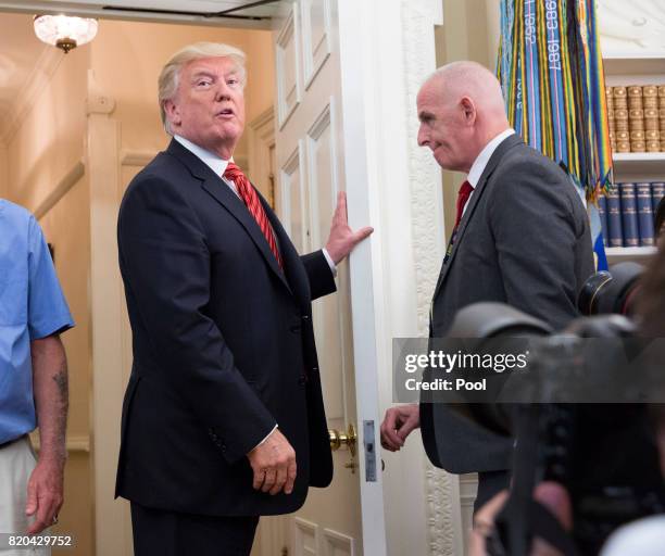 President Donald J. Trump departs after meeting with visiting USS Arizona survivors at the White House on July 21, 2017 in Washington, DC.