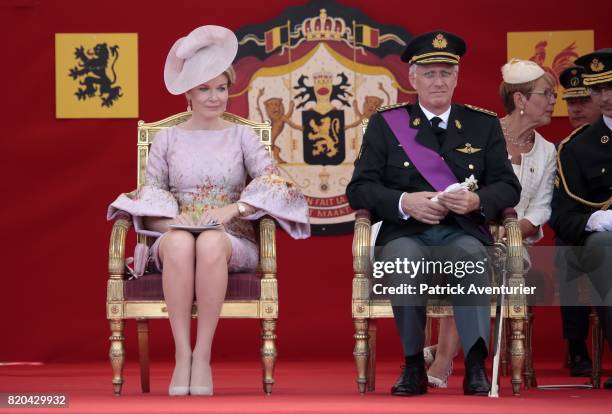 King Philippe of Belgium and Queen Mathilde of Belgium during the military parade on the Belgian National Day on July 21, 2017 in Brussels, Belgium.