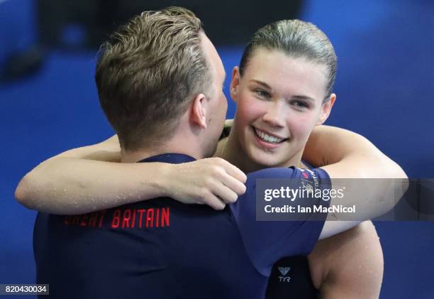 Grace Reid of Great Britain celebrates fourth place in the Women's 3m Springboard at the Duna Arena on day eight of the FINA World Championships on...