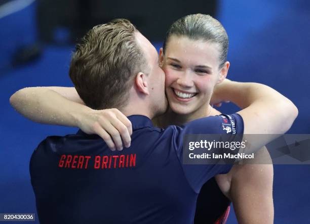 Grace Reid of Great Britain celebrates fourth place in the Women's 3m Springboard at the Duna Arena on day eight of the FINA World Championships on...