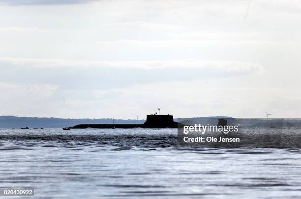 Russian nuclear submarine 'Dmitrij Donskoj' passes the Great Belt Bridge on July 21, 2017 near Korsor, Denmark. The 'Dmitrij Donskoj', the last of...