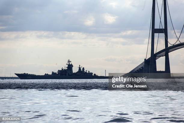 Russian battlecruiser 'Pjotr Velikij' passes the Great Belt Bridge as it leads nuclear submarine 'Dmitrij Donskoj' through the Danish waters on July...