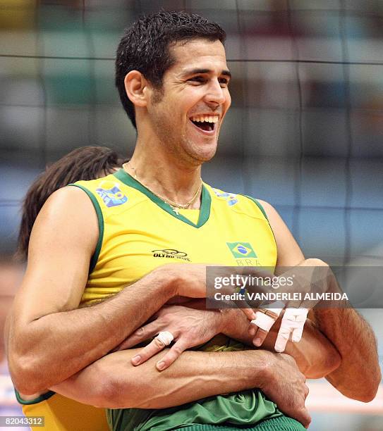 Brazil's Gilberto Godoy and Dante Guimaraes celebrate their victory over Russia at the end of their International Volleyball Federation World League...
