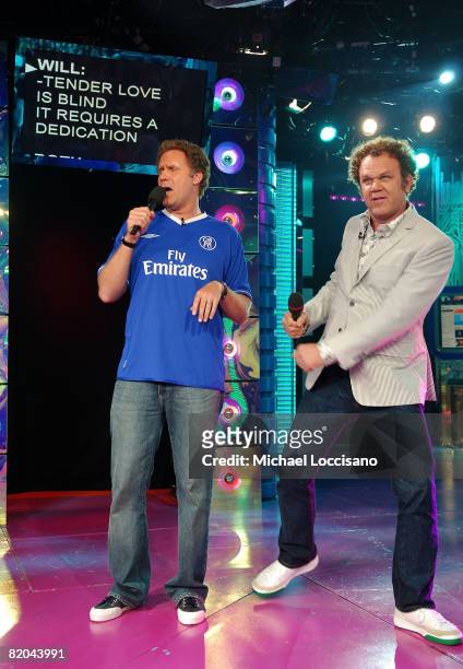 Actors Will Ferrell and John C. Reilly sing karaoke on MTV's "TRL" at MTV Studios on July 22, 2008 in New York City.