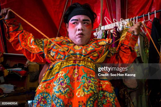 chinese opera during thailand vegetarian festival in bangkok, thailand - chinese opera in thailand stock pictures, royalty-free photos & images