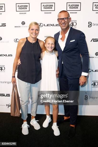 Astrid, Alegra and Andreas Rebbelmund attend the Breuninger show during Platform Fashion July 2017 at Areal Boehler on July 21, 2017 in Duesseldorf,...