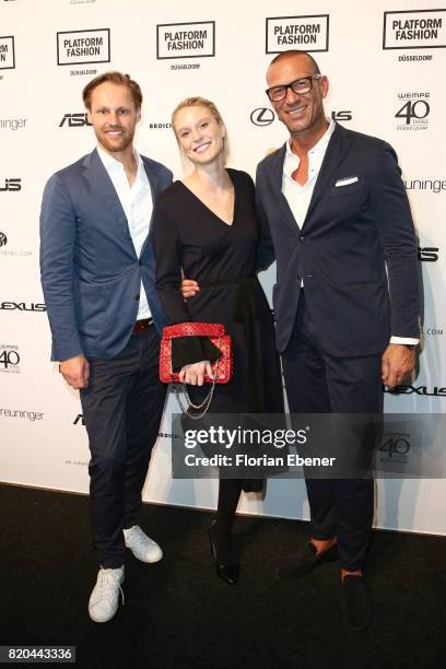 Thomas Hoehn, Kim Hnizdo and Andreas Rebbelmund attend the Breuninger show during Platform Fashion July 2017 at Areal Boehler on July 21, 2017 in...