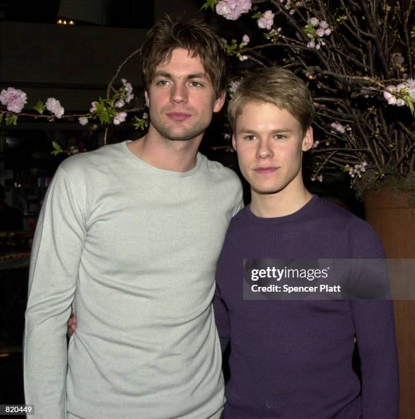 Actors Gale Harold, left, and Randy Harrison pose for photographers during a party for the Showtime television show "Queer As Folk" March 19, 2001 in...