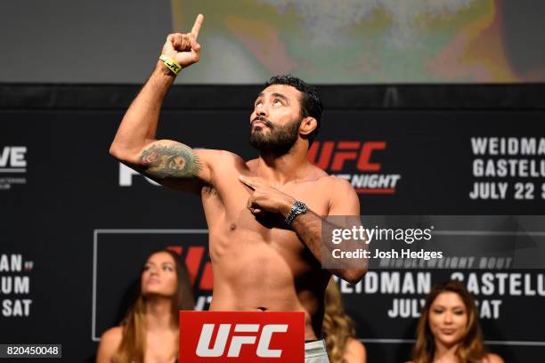 Rafael Natal of Brazil poses on the scale during the UFC Fight Night weigh-in inside the Nassau Veterans Memorial Coliseum on July 21, 2017 in...