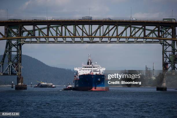 The Nord Steady oil and chemical tanker is guided by tugboats under the Second Narrows Bridge in Vancouver, British Columbia, Canada, on Tuesday,...
