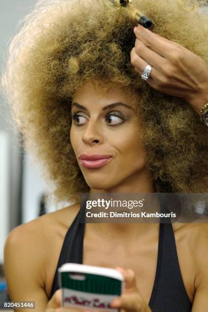 Model prepares backstage during the SWIMMIAMI Hammock 2018 Collection fashion show at WET Deck at W South Beach on July 21, 2017 in Miami Beach,...