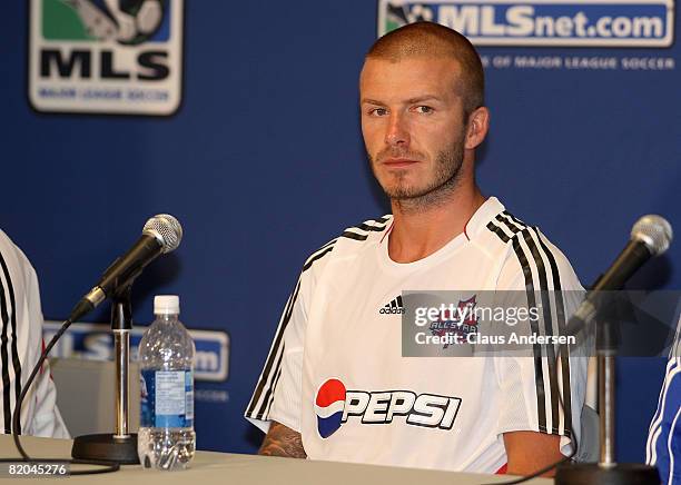 Midfielder David Beckham of L.A. Galaxy responds to questions during a press conference following a MLS All Star training session before the MLS All...
