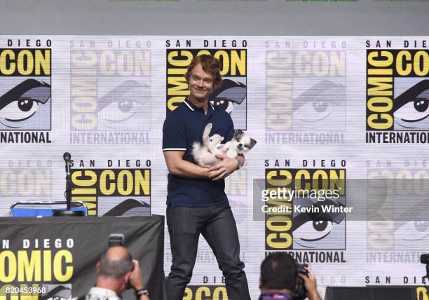 Actor Alfie Allen walks onstage at Comic-Con International 2017 "Game Of Thrones" panel And Q+A Session at San Diego Convention Center on July 21,...
