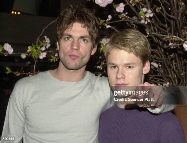 Actors Gale Harold, left, and Randy Harrison pose for photographers during a party for the Showtime television show "Queer As Folk" March 19, 2001 in...