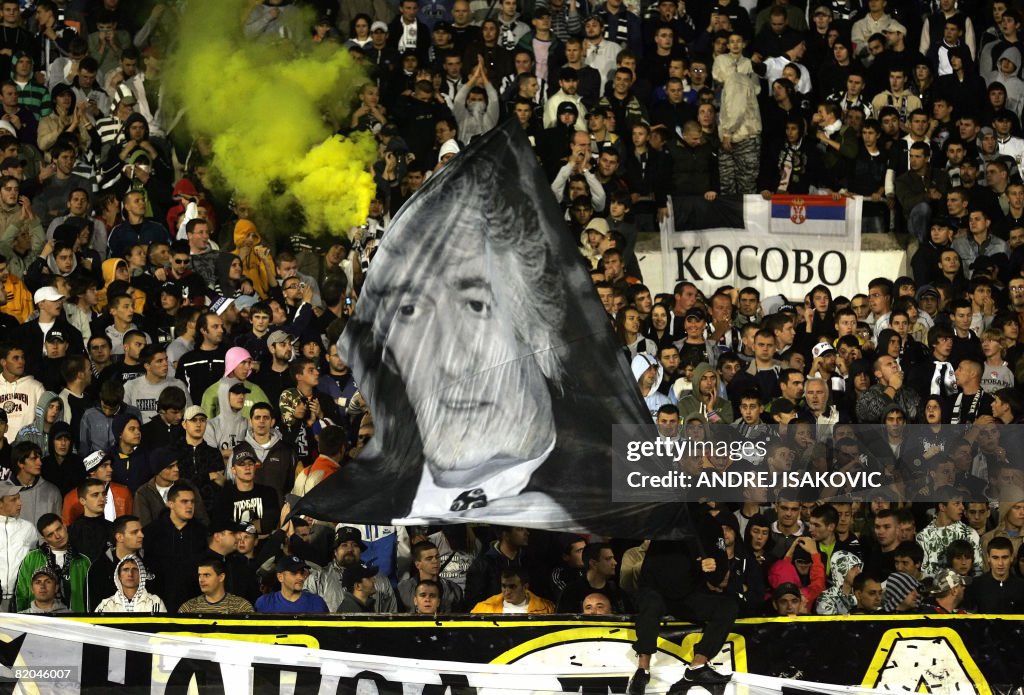 Supporters of Partizan Belgrade wave a f
