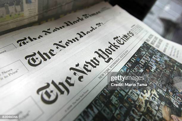 Copies of the New York Times sit for sale in a rack July 23, 2008 in New York City. The New York broadsheet announced it posted an 82 percent decline...