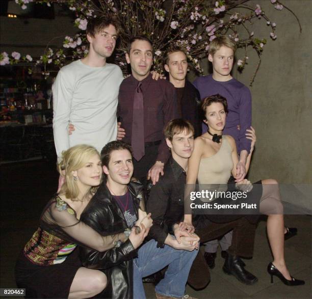 Cast members of Showtime's television show "Queer As Folk" pose for photographers during a party for the Showtime television show "Queer As Folk"...