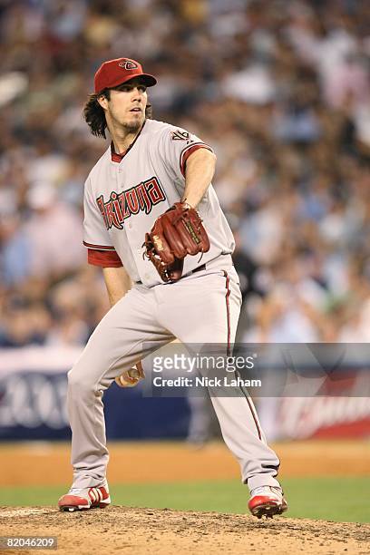 Pitcher Dan Haren of the National League All-Stars throws against the American League All-Stars during the 79th MLB All-Star Game at Yankee Stadium...