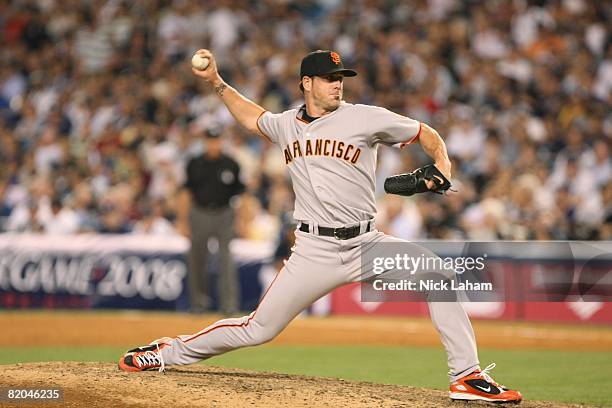 Brian Wilson of the National League All-Stars throws against the American League All-Stars during the 79th MLB All-Star Game at Yankee Stadium on...