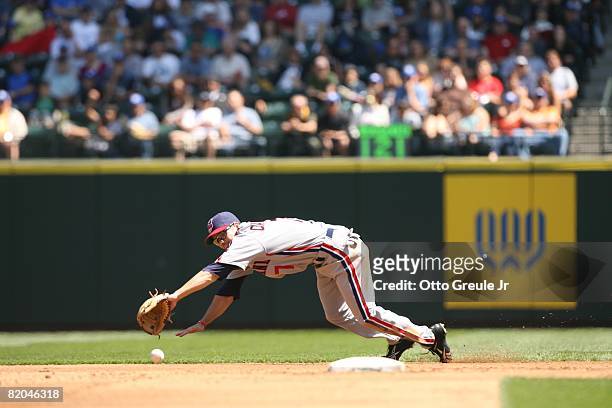 Jamey Carroll of the Cleveland Indians dives for a ball against the Seattle Mariners on July 19, 2008 at Safeco Field in Seattle, Washington.