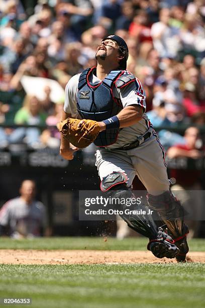 Sal Fasano of the Cleveland Indians gets under a pop up against the Seattle Mariners on July 19, 2008 at Safeco Field in Seattle, Washington.