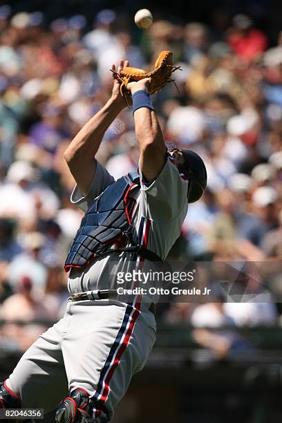 Sal Fasano of the Cleveland Indians catches a pop up against the Seattle Mariners on July 19, 2008 at Safeco Field in Seattle, Washington.
