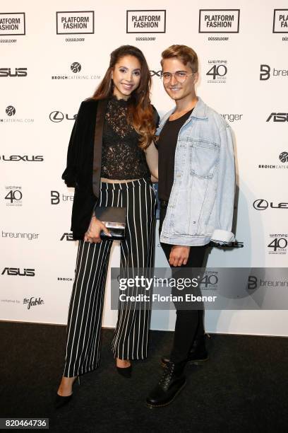 Julia Steyns and Max Leo attends the Breuninger show during Platform Fashion July 2017 at Areal Boehler on July 21, 2017 in Duesseldorf, Germany.