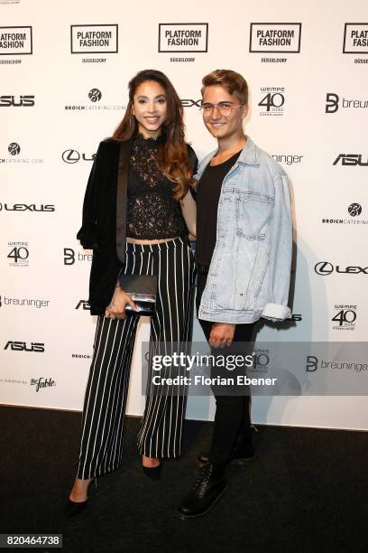 Julia Steyns and Max Leo attends the Breuninger show during Platform Fashion July 2017 at Areal Boehler on July 21, 2017 in Duesseldorf, Germany.