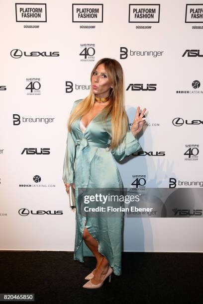 Guelcan Kamps attends the Breuninger show during Platform Fashion July 2017 at Areal Boehler on July 21, 2017 in Duesseldorf, Germany.