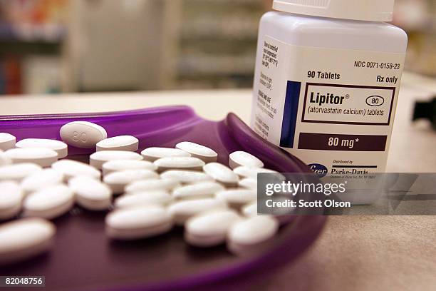 Lipitor tablets sit in a tray at a Pharmacy July 23, 2008 in Chicago, Illinois. Pfizer, the world's biggest drug maker and manufacturer of the...