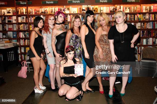 Alt porn star and entrepreneur Joanna Angel and the girls of Burning Angel.com pose for pictures before signing copies of "BurningAngel Book" at...