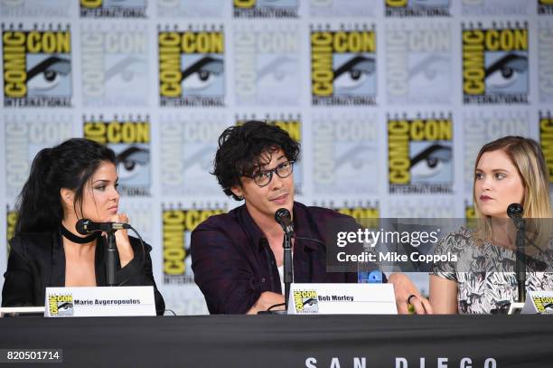 Marie Avgeropoulos, Bob Morley, and Eliza Taylor speak onstage at Comic-Con International 2017 "The 100" panel at San Diego Convention Center on July...