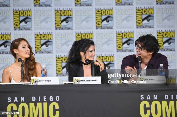 Lindsey Morgan, Marie Avgeropoulos and Bob Morley speak onstage at Comic-Con International 2017 "The 100" panel at San Diego Convention Center on...