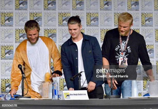 Actors Travis Fimmel, Alex Hogh Andersen and Alexander Ludwig attend the "Vikings" panel during San Diego Comic-Con International 2017 at San Diego...