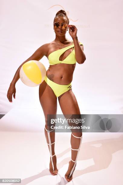 Model walks the runway during the Keva J Swimwear S/S 2018 fashion show at Loews Miami Beach Hotel on July 21, 2017 in Miami Beach, Florida.