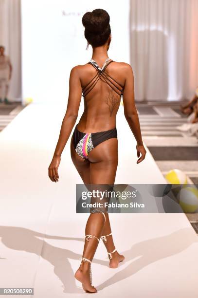 Model walks the runway during the Keva J Swimwear S/S 2018 fashion show at Loews Miami Beach Hotel on July 21, 2017 in Miami Beach, Florida.