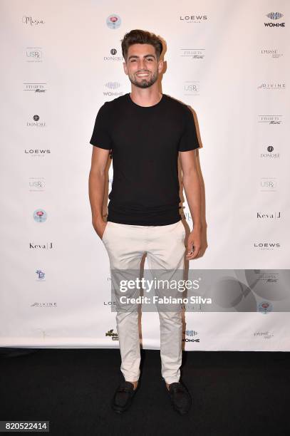 Tyler O'Brien attends the Keva J Swimwear S/S 2018 fashion show at Loews Miami Beach Hotel on July 21, 2017 in Miami Beach, Florida.