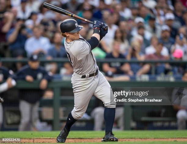 Clint Frazier of the New York Yankees hits a RBI-double off of starting pitcher Andrew Moore of the Seattle Mariners that scored Chase Headley of the...