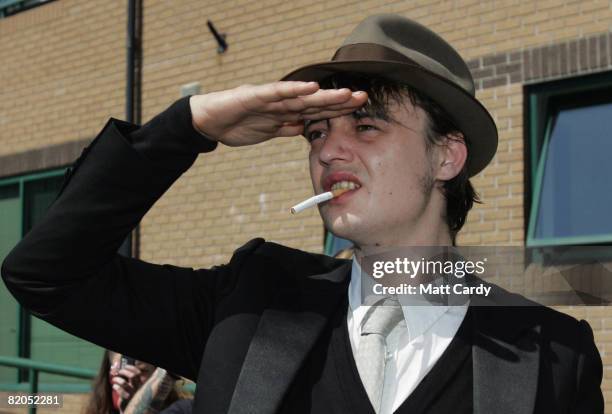 Pete Doherty smokes a cigarette outside Yeovil Magistrates Court on July 24 2008 in Yeovil, England. The troubled musician Pete Doherty was in court...
