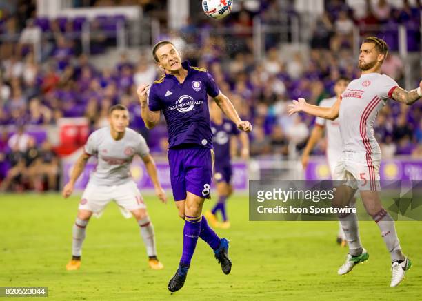 Orlando City SC forward Will Johnson heads the ball on goal during the MLS soccer match between the Orlando City SC and Atlanta United FC on July...