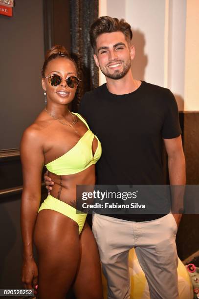 Eva Marcille and Tyler O'Brien attend the Keva J Swimwear S/S 2018 fashion show at Loews Miami Beach Hotel on July 21, 2017 in Miami Beach, Florida.